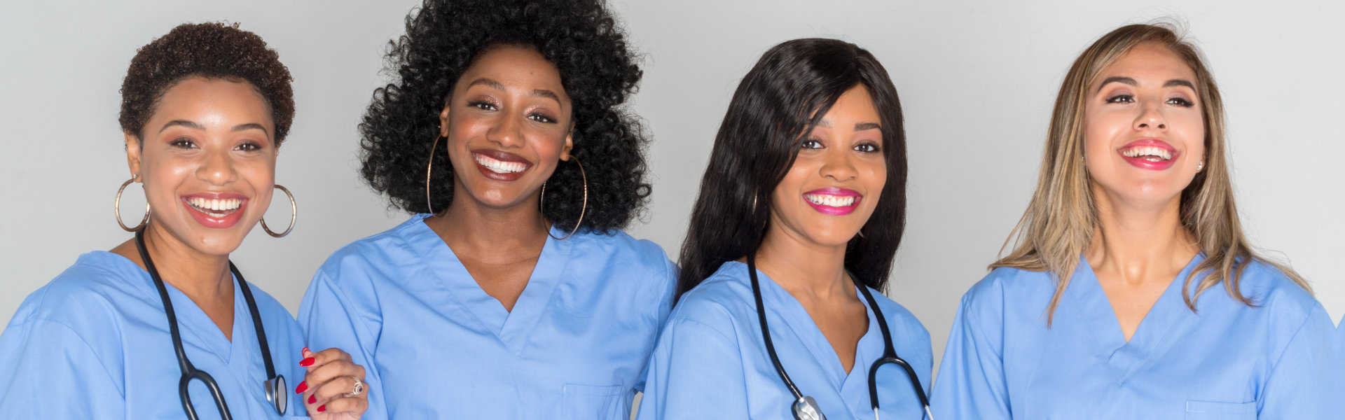group of nurses smiling